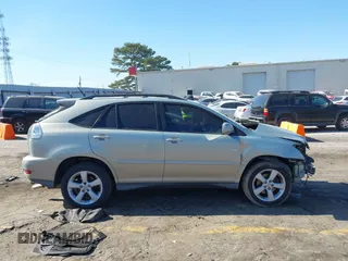2005 Lexus RX 330 with VIN 2T2GA31UX5C038570, listed as a IAAI auction lot 41492199 with 185,000 mi miles and . Bid and sale history available at DreamBid. Image 13.