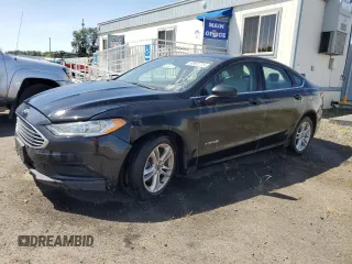 2018 Ford Fusion S z VIN 3FA6P0UU2JR100742, wystawiony jako Copart lot #59962275 z przebiegiem Nie podano mil oraz Czysty tytuł • Clean title. Historia ofert i sprzedaży dostępna na DreamBid. Obrazek 1.