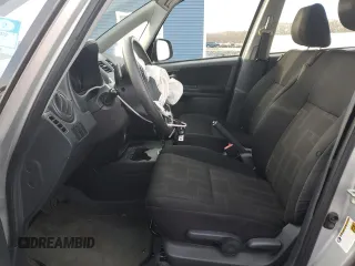 2011 Suzuki SX4 LE with VIN JS2YC5A23B6300189, listed as a Copart auction lot 85389574 with 71,272 mi miles and Clean Title. Bid and sale history available at carsss.com. Image 7.