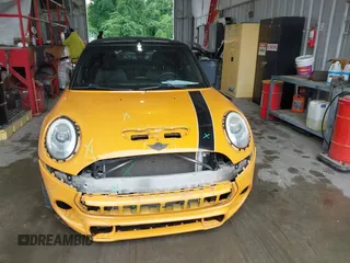 2017 MINI Convertible Cooper S z VIN WMWWG9C31H3C81428, wystawiony jako IAAI lot #42192920 z przebiegiem 75 861 mil mil oraz . Historia ofert i sprzedaży dostępna na DreamBid. Obrazek 13.