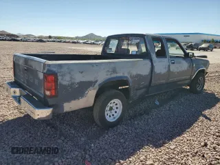 1990 Dodge Dakota z VIN 1B7FL23X7LS653679, wystawiony jako Copart lot #72073034 z przebiegiem 254 327 mil mil oraz Szkoda całkowita • Salvage title. Historia ofert i sprzedaży dostępna na DreamBid. Obrazek 3.