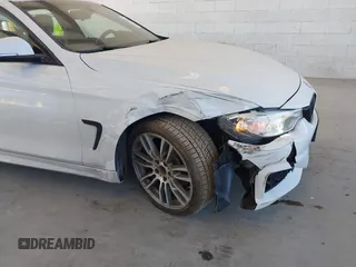 2015 BMW 4 Series 428i xDrive z VIN WBA4A7C55FD413965, wystawiony jako IAAI lot #42368615 z przebiegiem 108 308 mil mil oraz . Historia ofert i sprzedaży dostępna na DreamBid. Obrazek 6.