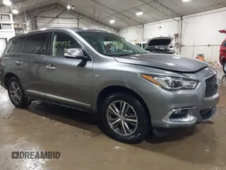 2020 Infiniti QX60 LUXE with VIN 5N1DL0MM7LC518790, listed as a IAAI auction lot 41393932 with 80,232 mi miles. Bid and sale history available at carsss.com. Image 1.