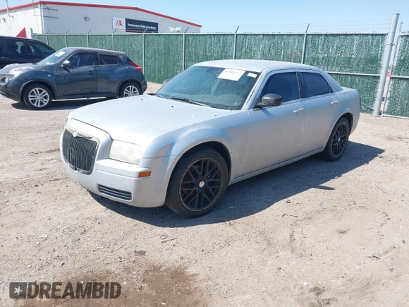 2007 Chrysler 300 with VIN 2C3KA43R67H664434, listed as a IAAI auction lot 41884172 with 238,451 mi miles. Bid and sale history available at carsss.com. Image 2.