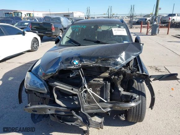 2015 BMW X1 sDrive28i with VIN WBAVM1C58FV498559, listed as a IAAI auction lot 41208638 with 100,452 mi miles. Bid and sale history available at carsss.com. Image 12.