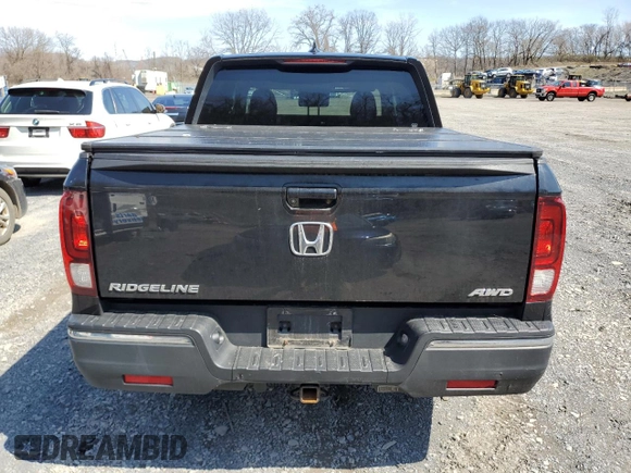 2020 Honda Ridgeline Sport with VIN 5FPYK3F16LB019969, listed as a Copart auction lot 52697765 with 110,170 mi miles and Salvage title. Bid and sale history available at DreamBid. Image 6.