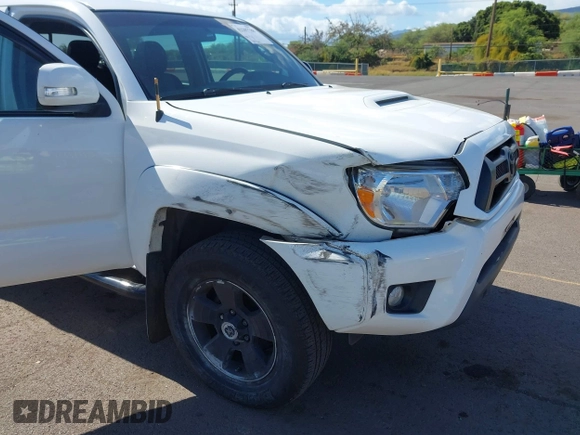 2014 Toyota Tacoma PreRunner z VIN 3TMJU4GN8EM160522, wystawiony jako IAAI lot #42207788 z przebiegiem 103 361 mil mil oraz . Historia ofert i sprzedaży dostępna na DreamBid. Obrazek 6.