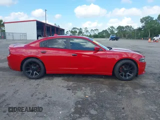 2016 Dodge Charger SXT z VIN 2C3CDXHG2GH132909, wystawiony jako IAAI lot #41918228 z przebiegiem 111 988 mil mil oraz . Historia ofert i sprzedaży dostępna na DreamBid. Obrazek 13.