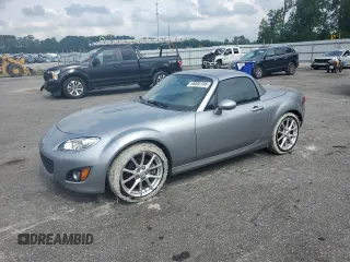 2011 Mazda MX-5 Miata Grand Touring with VIN JM1NC2PFXB0215200, listed as a Copart auction lot 65682105 with Not provided miles and Clean title. Bid and sale history available at DreamBid. Image 1.