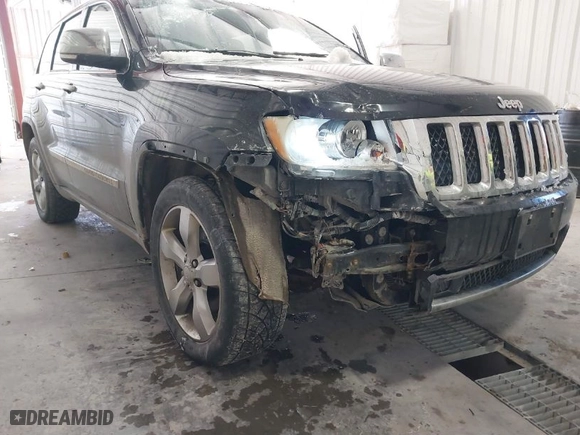 2011 Jeep Grand Cherokee Overland Summit with VIN 1J4RR6GT5BC702214, listed as a IAAI auction lot 41368605 with 183,068 mi miles. Bid and sale history available at carsss.com. Image 6.