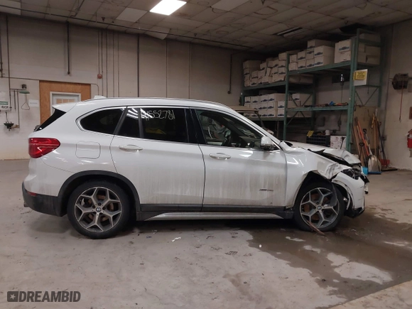 2016 BMW X1 xDrive28i with VIN WBXHT3C30G5E52065, listed as a IAAI auction lot 41552781 with 205,961 mi miles. Bid and sale history available at carsss.com. Image 12.