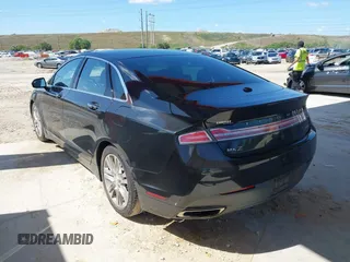 2014 Lincoln MKZ with VIN 3LN6L2G97ER824923, listed as a IAAI auction lot 41998794 with 96,847 mi miles. Bid and sale history available at carsss.com. Image 3.