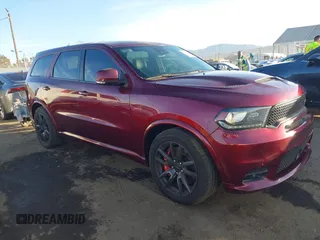 2019 Dodge Durango SRT with VIN 1C4SDJGJXKC556870, listed as a IAAI auction lot 41125324 with 16,857 mi miles and . Bid and sale history available at DreamBid. Image 1.