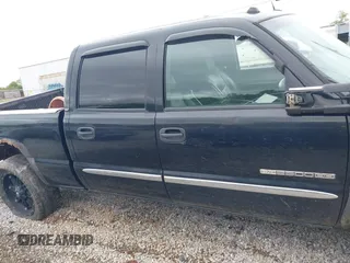 2005 GMC Sierra 2500HD SLE z VIN 1GTHK23U75F816621, wystawiony jako IAAI lot #41965293 z przebiegiem 341 770 mil mil oraz . Historia ofert i sprzedaży dostępna na DreamBid. Obrazek 13.