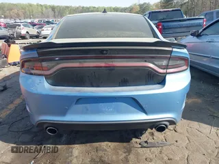 2019 Dodge Charger Scat Pack with VIN 2C3CDXGJ0KH613053, listed as a IAAI auction lot 41908658 with 85,000 mi miles and . Bid and sale history available at DreamBid. Image 6.