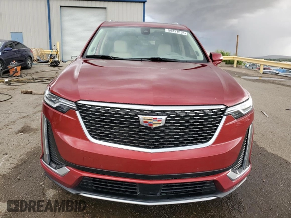 2024 Cadillac XT6 FWD Premium Luxury with VIN 1GYKPCRS1RZ700168, listed as a Copart auction lot 59327055 with 21,001 mi miles and Salvage title. Bid and sale history available at DreamBid. Image 5.