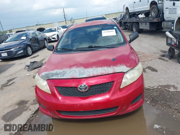 2009 Toyota Corolla with VIN JTDBL40E99J029281, listed as a IAAI auction lot 42460666 with 215,845 mi miles and . Bid and sale history available at DreamBid. Image 12.