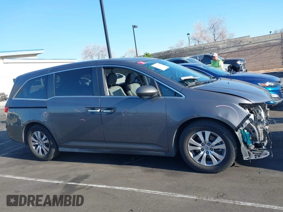 2015 Honda Odyssey EX-L with VIN 5FNRL5H61FB126933, listed as a IAAI auction lot 42003978 with 69,025 mi miles and . Bid and sale history available at carsss.com. Image 14.