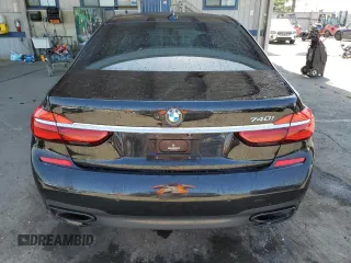 2016 BMW 7 Series 740i z VIN WBA7E2C55GG547282, wystawiony jako Copart lot #57740095 z przebiegiem Nie podano mil oraz Szkoda całkowita • Salvage title. Historia ofert i sprzedaży dostępna na DreamBid. Obrazek 6.