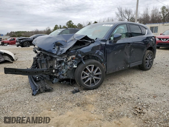 2018 Mazda CX-5 Grand Touring z VIN JM3KFBDM6J0359359, wystawiony jako Copart lot #48018105 z przebiegiem 74 227 mil mil oraz Szkody całkowita. Historia ofert i sprzedaży dostępna na DreamBid. Obrazek 1.