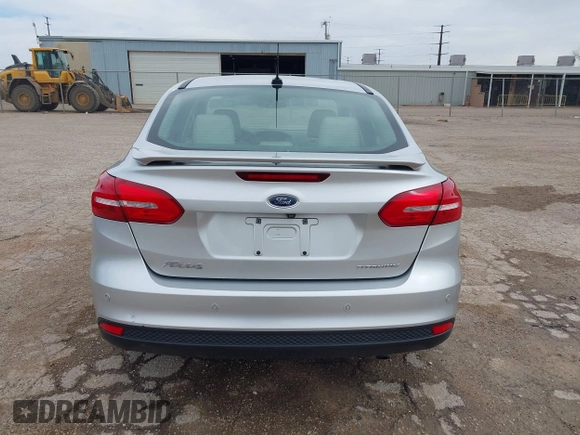 2017 Ford Focus Titanium with VIN 1FADP3J24HL229702, listed as a IAAI auction lot 42057013 with 120,250 mi miles and . Bid and sale history available at DreamBid. Image 16.