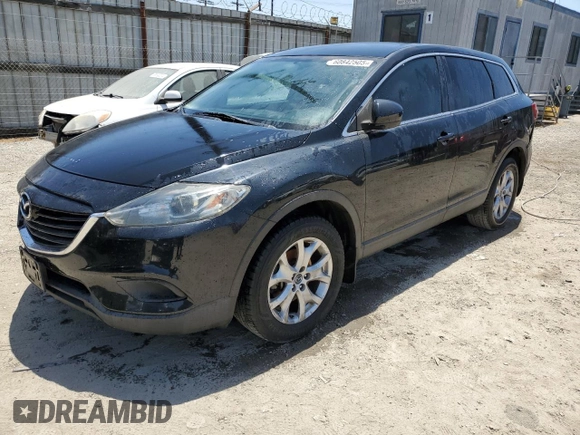 2015 Mazda CX-9 Sport z VIN JM3TB2BAXF0447315, wystawiony jako Copart lot #60842505 z przebiegiem 122 281 mil mil oraz Szkoda całkowita • Salvage title. Historia ofert i sprzedaży dostępna na DreamBid. Obrazek 1.