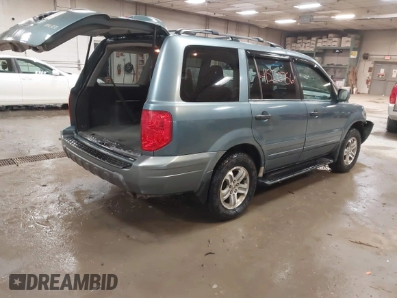 2005 Honda Pilot EX-L with RES with VIN 2HKYF18615H515907, listed as a IAAI auction lot 41520756 with 172,939 mi miles. Bid and sale history available at carsss.com. Image 4.