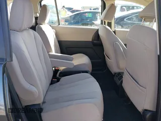 2014 Mazda 5 Sport with VIN JM1CW2BL5E0166522, listed as a IAAI auction lot 41635454 with 94,225 mi miles and . Bid and sale history available at DreamBid. Image 8.