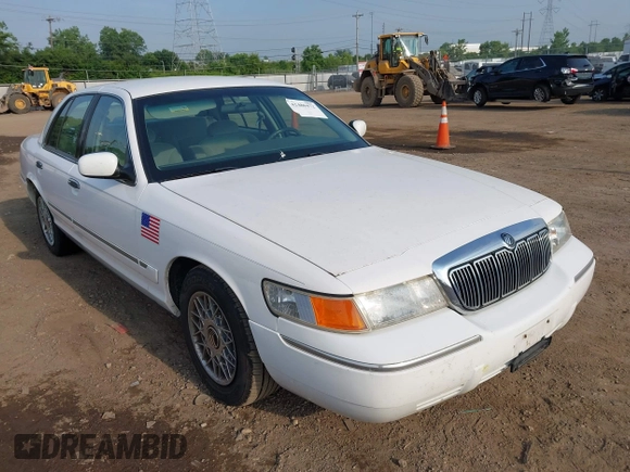 2002 Mercury Grand Marquis GS z VIN 2MEFM74W12X630926, wystawiony jako IAAI lot #42480472 z przebiegiem 58 884 mil mil oraz . Historia ofert i sprzedaży dostępna na DreamBid. Obrazek 1.