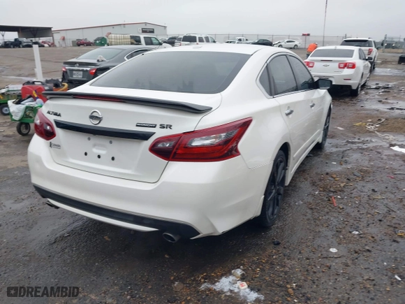 2018 Nissan Altima 2.5 SL with VIN 1N4AL3AP3JC163577, listed as a IAAI auction lot 41406241 with 138,214 mi miles. Bid and sale history available at carsss.com. Image 4.