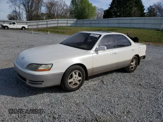 1995 Lexus ES with VIN JT8GK13T8S0107061, listed as a Copart auction lot 49986875 with 306,343 mi miles and Salvage Title. Bid and sale history available at carsss.com. Image 1.