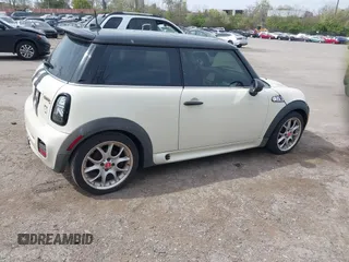 2008 MINI Hardtop S with VIN WMWMF73578TV33406, listed as a IAAI auction lot 42081596 with 120,183 mi miles and . Bid and sale history available at DreamBid. Image 4.