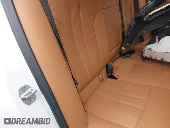 2023 BMW 5 Series 530i xDrive with VIN WBA13BJ06PWY21307, listed as a IAAI auction lot 41244931 with 12,391 mi miles and . Bid and sale history available at DreamBid. Image 8.