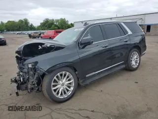2021 Cadillac Escalade Premium Luxury z VIN 1GYS4CKL4MR193058, wystawiony jako Copart lot #57550955 z przebiegiem 47 761 mil mil oraz Szkoda całkowita • Salvage title. Historia ofert i sprzedaży dostępna na DreamBid. Obrazek 1.