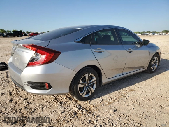 2017 Honda Civic LX z VIN 19XFC2F50HE032708, wystawiony jako Copart lot #52510535 z przebiegiem 83 467 mil mil oraz Szkoda całkowita • Salvage title. Historia ofert i sprzedaży dostępna na DreamBid. Obrazek 3.