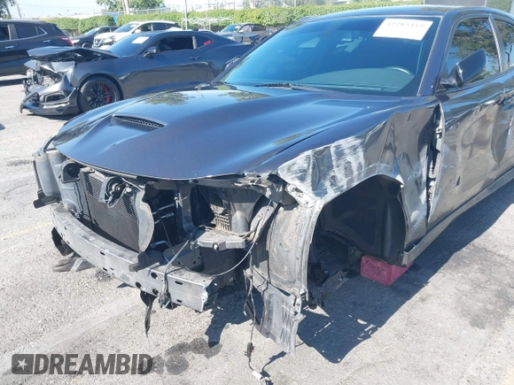 2019 Dodge Charger R/T z VIN 2C3CDXCT7KH527732, wystawiony jako IAAI lot #42283453 z przebiegiem 99 755 mil mil oraz . Historia ofert i sprzedaży dostępna na DreamBid. Obrazek 6.