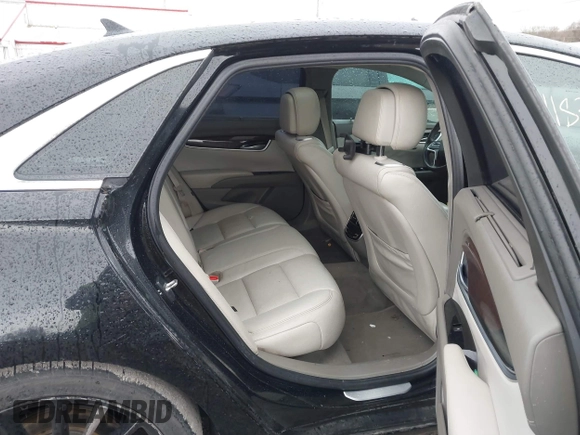 2014 Cadillac XTS Platinum with VIN 2G61W5S84E9291640, listed as a IAAI auction lot 41877867 with 100,462 mi miles and . Bid and sale history available at DreamBid. Image 8.