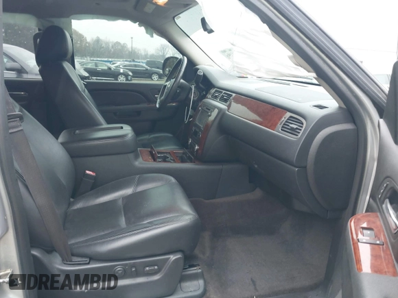2014 Chevrolet Suburban LTZ with VIN 1GNSCKE05ER173446, listed as a IAAI auction lot 41047096 with 189,049 mi miles and . Bid and sale history available at DreamBid. Image 5.