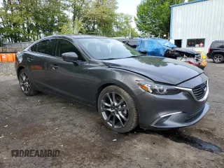 2017 Mazda 6 Grand Touring с VIN JM1GL1W55H1140064, выставлен на аукционе Copart как лот 57503425 с пробегом 74 304 миль миль и Списание • Salvage title. История ставок и продаж доступна на DreamBid. Изображение 4.