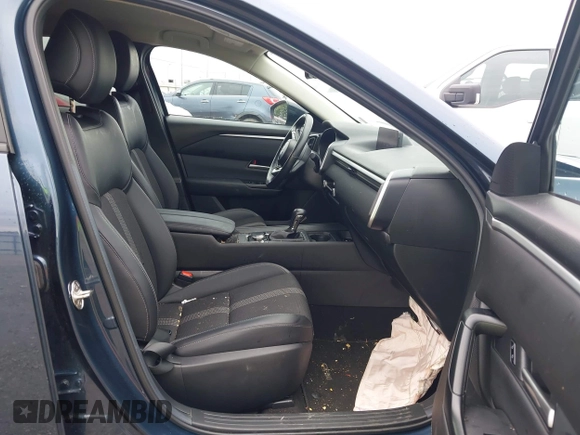2024 Mazda CX-50 S Preferred with VIN 7MMVABBM1RN166557, listed as a IAAI auction lot 42483021 with Not provided miles and . Bid and sale history available at DreamBid. Image 5.