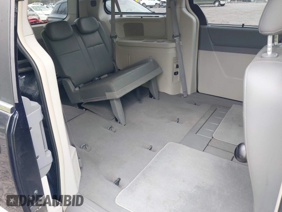 2010 Chrysler Town & Country Touring with VIN 2A4RR5D15AR170014, listed as a IAAI auction lot 42202810 with 199,557 mi miles and . Bid and sale history available at DreamBid. Image 8.