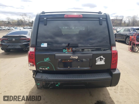 2009 Jeep Commander Sport z VIN 1J8HG48K39C554570, wystawiony jako Copart lot #52667825 z przebiegiem 194 886 mil mil oraz Szkoda całkowita • Salvage title. Historia ofert i sprzedaży dostępna na DreamBid. Obrazek 6.