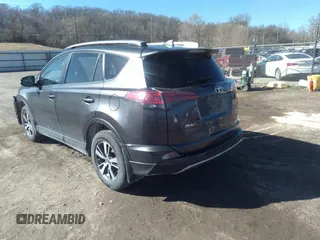 2018 Toyota RAV4 XLE with VIN JTMRFREV9JJ742276, listed as a IAAI auction lot 41855530 with 115,815 mi miles. Bid and sale history available at carsss.com. Image 3.