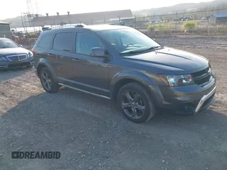 2015 Dodge Journey Crossroad with VIN 3C4PDDGG3FT567067, listed as a IAAI auction lot 42082682 with 88,880 mi miles. Bid and sale history available at carsss.com. Image 1.