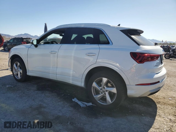 2020 Audi Q3 Premium with VIN WA1AECF30L1023652, listed as a Copart auction lot 57148915 with 69,621 mi miles and Salvage title. Bid and sale history available at DreamBid. Image 2.