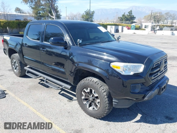 2018 Toyota Tacoma SR with VIN 3TMCZ5AN2JM127244, listed as a IAAI auction lot 41698199 with 61,535 mi miles and . Bid and sale history available at DreamBid. Image 1.