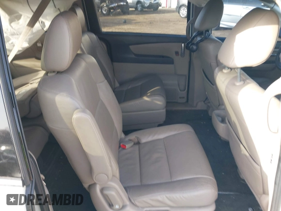 2014 Honda Odyssey Touring with VIN 5FNRL5H97EB037358, listed as a IAAI auction lot 41832825 with 208,894 mi miles and . Bid and sale history available at DreamBid. Image 8.