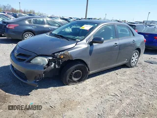 2011 Toyota Corolla L with VIN JTDBU4EE4B9144190, listed as a IAAI auction lot 42060728 with 115,299 mi miles. Bid and sale history available at carsss.com. Image 2.
