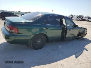1999 Mazda 626 ES with VIN 1YVGF22C1X5896686, listed as a Copart auction lot 72012584 with 123,672 mi miles and Salvage Title. Bid and sale history available at carsss.com. Image 3.