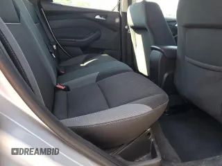 2012 Ford Focus SE z VIN 1FAHP3K20CL219046, wystawiony jako Copart lot #58771285 z przebiegiem 167 703 mil mil oraz Szkoda całkowita • Salvage title. Historia ofert i sprzedaży dostępna na DreamBid. Obrazek 10.